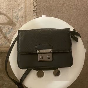 Black snakeskin crossbody purse / Bag. Used as seen on the picture